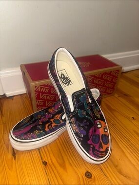 Vans Slip-On Sneakers with Purple and Orange Skull Print